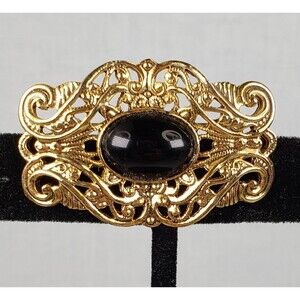 Vintage 1928 Ornate Oval Gold Tone Filigree and Black Cabochon Brooch